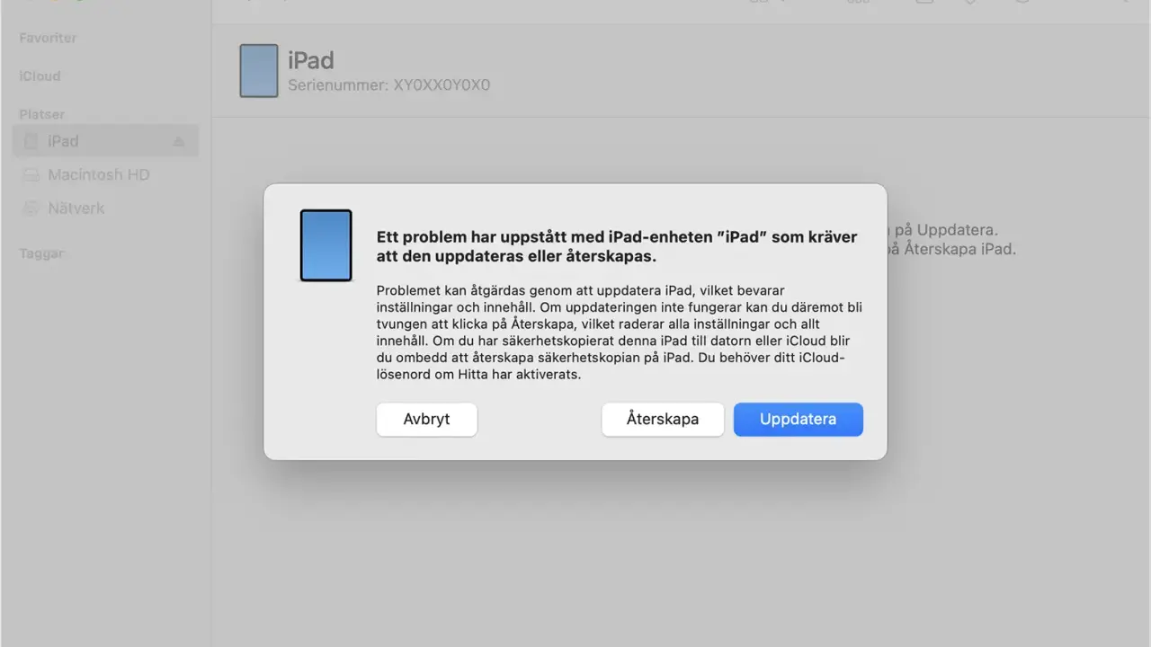 Ett felmeddelande visas för en iPad som inte startar. Det föreslås att uppdatera eller återskapa enheten.
