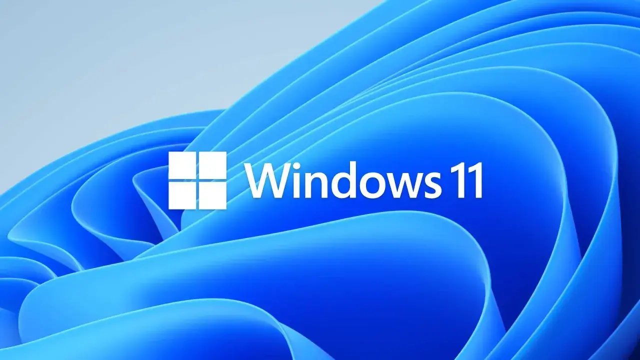 Utforskaren Windows 11 med dess ikon och logotyp mot en blå bakgrund med mjuka vågor.