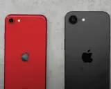 Två iPhones, en röd och en svart, ligger sida vid sida. Den röda har ett Apple-märke och en kamera. Den svarta har också ett Apple-märke och en kamera. Kanske en iPhone SE 4?