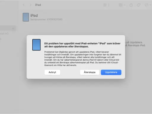 Ett felmeddelande visas för en iPad som inte startar. Det föreslås att uppdatera eller återskapa enheten.