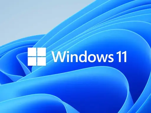 Utforskaren Windows 11 med dess ikon och logotyp mot en blå bakgrund med mjuka vågor.
